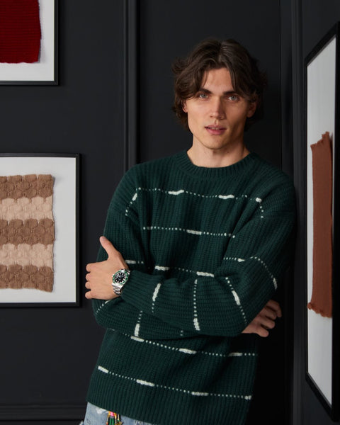 Man wearing ENEX Cadence green striped merino wool sweater
