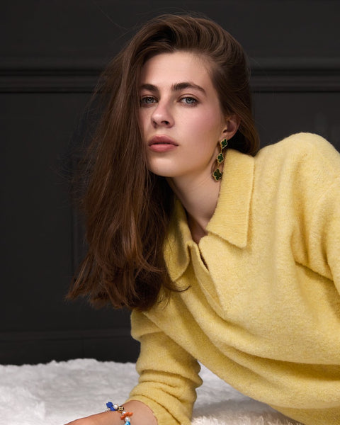 Woman wearing ENEX Teddy yellow boucle polo sweater