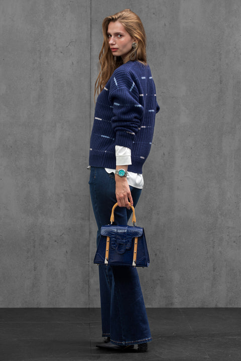 Woman wearing ENEX Cadence denim blue striped merino wool sweater (2 of 6)