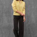 Woman wearing ENEX Teddy yellow boucle polo sweater (1 of 6)